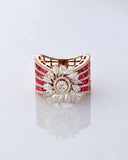 A radiant bloom of brilliant diamonds set against layers of rich rubies—crafted to make every moment shine. (PGDR0515)