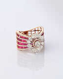 A radiant bloom of brilliant diamonds set against layers of rich rubies—crafted to make every moment shine. (PGDR0515)
