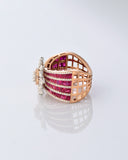 A radiant bloom of brilliant diamonds set against layers of rich rubies—crafted to make every moment shine. (PGDR0515)