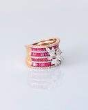 Layers of radiant rubies framed with shimmering diamonds, crowned by a floral diamond motif—pure elegance in every detail. (PGDR0517)