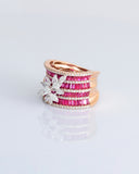 Layers of radiant rubies framed with shimmering diamonds, crowned by a floral diamond motif—pure elegance in every detail. (PGDR0517)