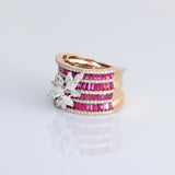 Layers of radiant rubies framed with shimmering diamonds, crowned by a floral diamond motif—pure elegance in every detail. (PGDR0517)