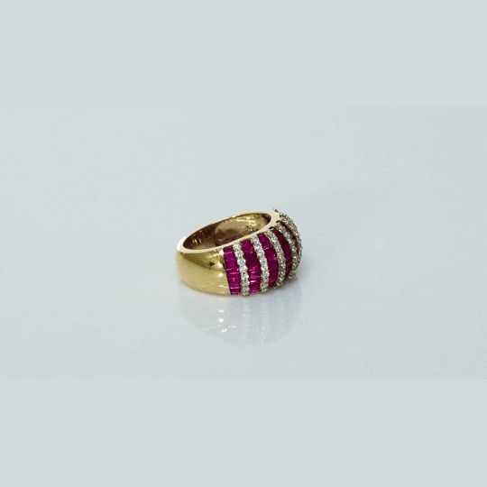 Beautiful ruby and diamond bands come together in this eye-catching ring, designed for effortless glamour and charm.(PGDR0518)