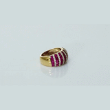 Beautiful ruby and diamond bands come together in this eye-catching ring, designed for effortless glamour and charm.(PGDR0518)