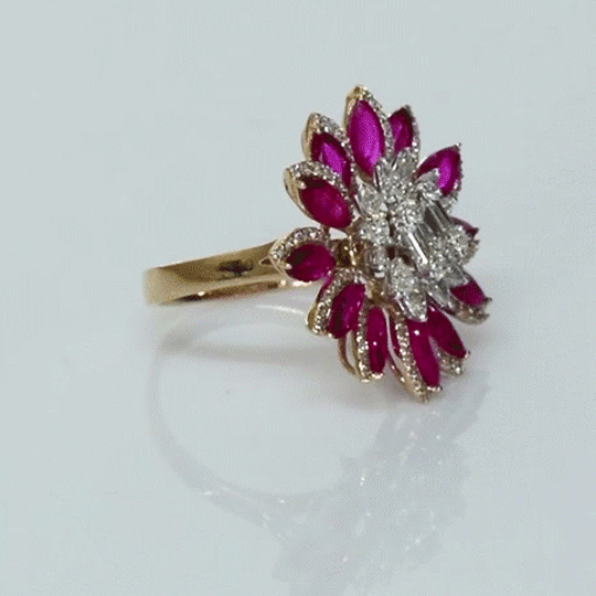 Ruby petals and sparkling diamonds bloom together in this floral ring, creating a vibrant and elegant statement piece.(PGDR0521)