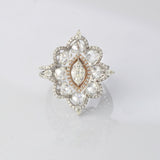 A graceful blend of rose-cut and round diamonds, crafted into a stunning ring with classic beauty and charm.(PGDR0522)