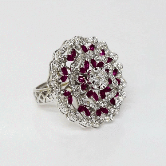 A striking ruby and diamond ring featuring vibrant rubies paired with sparkling diamonds for timeless elegance and refined luxury. (PGDR078)