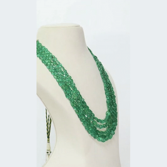 A luxurious five-layer necklace of premium emerald long beads, featuring deep, vibrant color and exceptional quality, designed to make a striking and elegant statement.(STRG326)