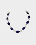 A single-line necklace with South Sea pearls and long tanzanite maniya, strung on gold wire for a simple, elegant, and timeless look.(STRG360)