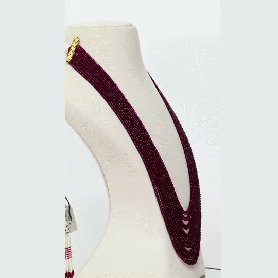 A graceful multi-layer necklace of deep red ruby beads, crafted for a timeless, elegant, and understated traditional look. (STRG366)