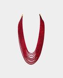 A graceful multi-layer necklace of deep red ruby beads, crafted for a timeless, elegant, and understated traditional look. (STRG366)