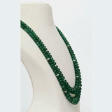 An elegant two-line necklace featuring luminous round emerald beads accented with diamond rondelles, creating timeless sophistication and refined luxury for occasion wear. (STRG380)