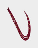 A luxurious three-layer necklace of premium Burmese ruby beads accented with diamond rondelles, showcasing rich colour, exceptional quality, and timeless elegance for a refined statement look. (STRG390)