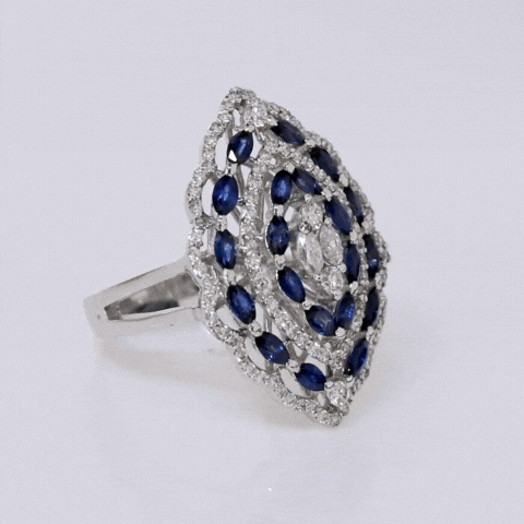 Ring adorned with a breathtaking combination of diamonds and blue sapphire, designed to captivate hearts and elevate style.(PGDR0233)