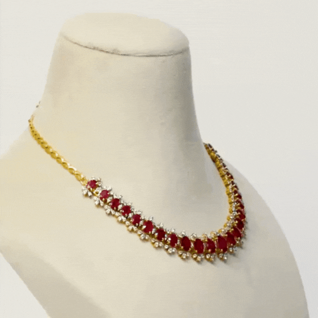 Embrace luxury and allure with our Ruby oval and diamond Necklace cum Bracelet set. Radiating elegance and sophistication, this exquisite ensemble effortlessly blends classic charm with modern glamour.(PGDNE0126)