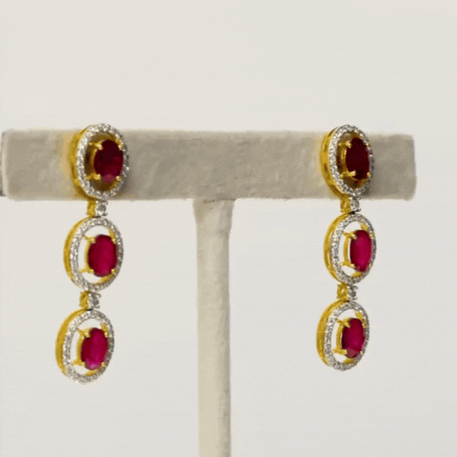 Unveil the epitome of sophistication with our captivating Ruby oval cut necklace and earring pair, adorned with dazzling diamonds.(GDNE0466)