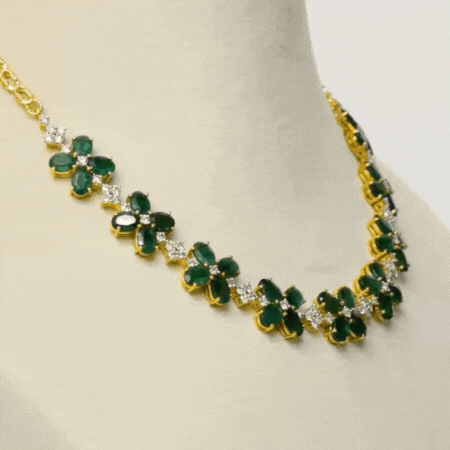 Our exquisite emerald and diamond necklace paired perfectly with luxurious tops, adding a touch of sophistication to any look.(GDNE0489)