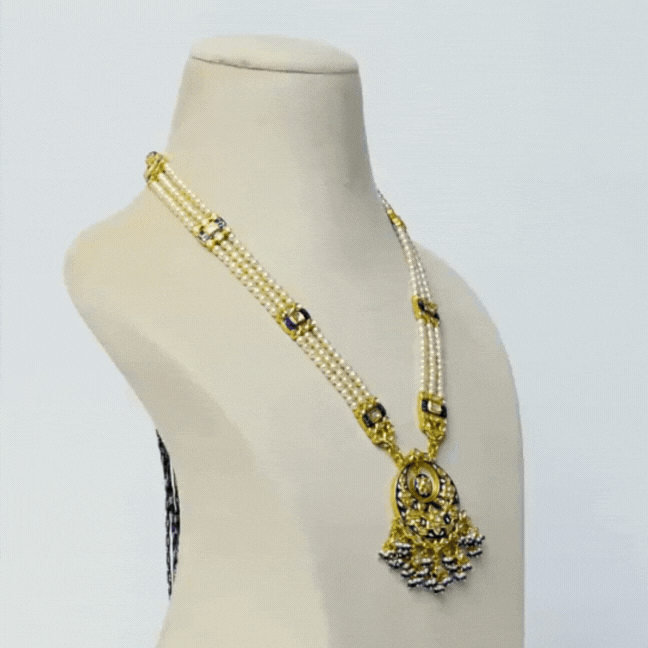 Blue Meena long necklace, adorned with dazzling diamond polki and lustrous pearls.(KMPE1280)