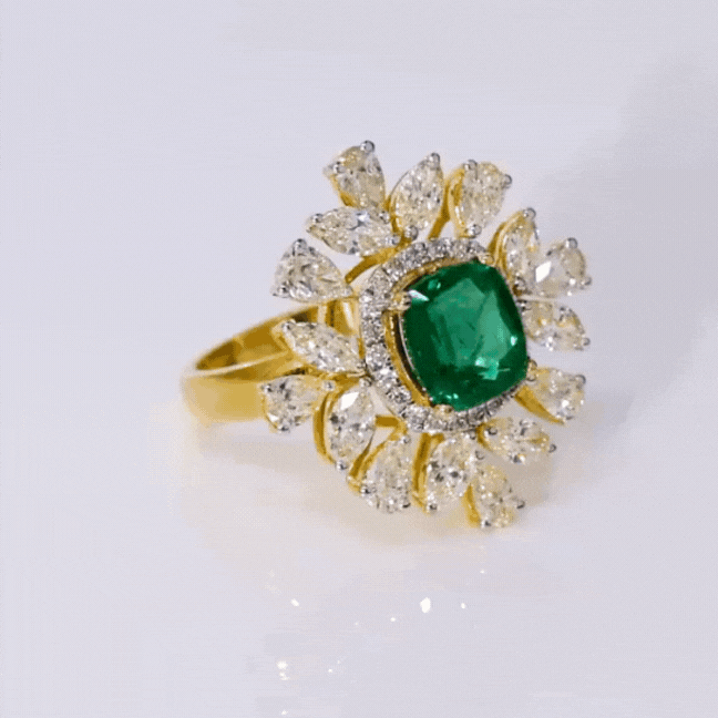 Introducing our exquisite Ring, a masterpiece of unparalleled beauty and sophistication, adorned with a fine quality Emerald and an array of multi-shaped Diamonds.(PGDR0434)