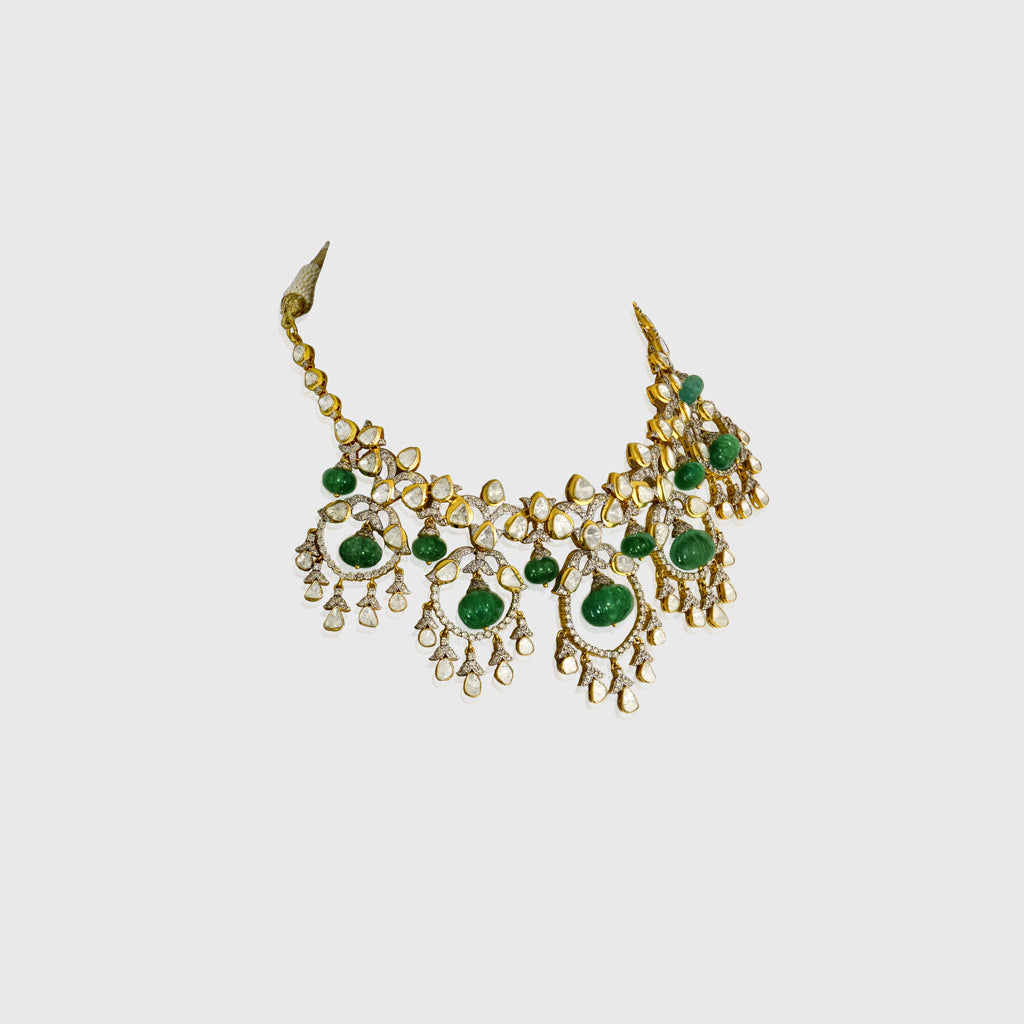 Enchanting necklace and earring pair featuring uncut diamond Polki and sparkling round diamonds, beautifully strung with large Colombian round beads in a graceful chand design—perfect for timeless elegance and royal charm.(WDN1201)