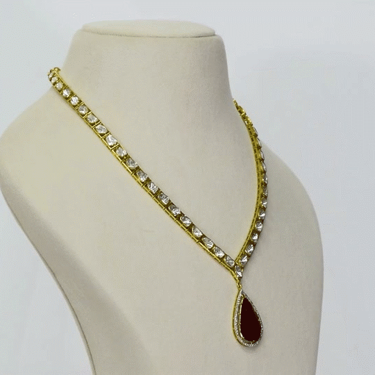 Elegant necklace and earrings with polki and round diamonds, featuring a striking central tourmaline.(WDN1236)