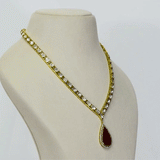 Elegant necklace and earrings with polki and round diamonds, featuring a striking central tourmaline.(WDN1236)