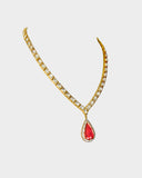 Elegant necklace and earrings with polki and round diamonds, featuring a striking central tourmaline.(WDN1236)