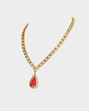 Elegant necklace and earrings with polki and round diamonds, featuring a striking central tourmaline.(WDN1236)