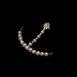 Traditional artistry meets contemporary brilliance in this elegant hathphool, featuring radiant diamond polki and shimmering round diamonds with timeless sophistication.(WDN1255)