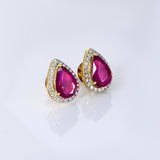 A timeless pairing of vivid rubies and dazzling diamonds in a graceful pear silhouette.(WDN1261)
