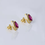 A timeless pairing of vivid rubies and dazzling diamonds in a graceful pear silhouette.(WDN1261)