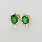 Rich oval emeralds surrounded by sparkling round diamonds, a perfect blend of beauty and sophistication.(WDN1282)