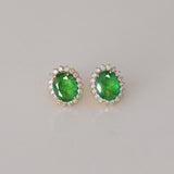 Rich oval emeralds surrounded by sparkling round diamonds, a perfect blend of beauty and sophistication.(WDN1282)