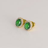 Rich oval emeralds surrounded by sparkling round diamonds, a perfect blend of beauty and sophistication.(WDN1282)