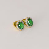 Rich oval emeralds surrounded by sparkling round diamonds, a perfect blend of beauty and sophistication.(WDN1282)