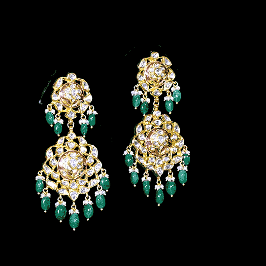 Necklace and Earring pair in red enameled with uncut diamond in 22k gold.The traditional red Meena necklace and earring pair is an exquisite piece of jewelry that exudes timeless elegance and sophistication. - KMNE3178